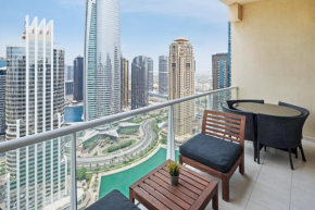 Modern & Spacious 2-Bed Condo with Panoramic Lake Views, Dual Balconies, Steps from Dubai JLT Metro By 